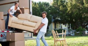 couple-moving-couch-into-moving-truck