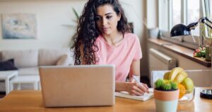 Young woman using her internet for work