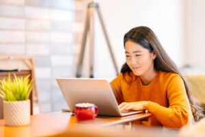 Young women using laptop