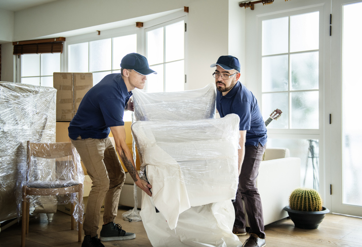 Movers moving furniture