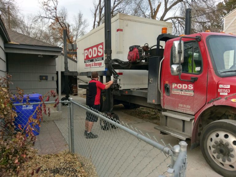 PODS moving container being loaded onto truck