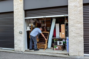 Man packing a temporary storage unit