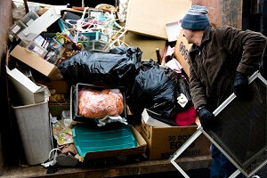 Man throwing junk away